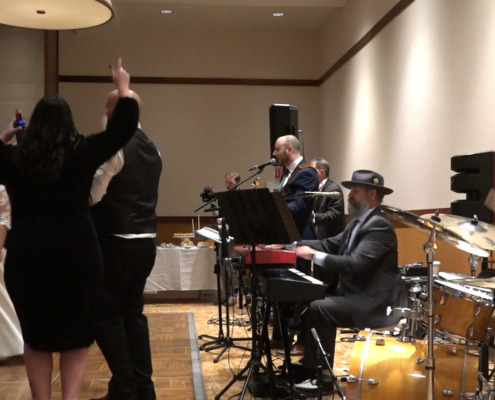 bride twirling to "Dancing Queen" played live by The Way Band