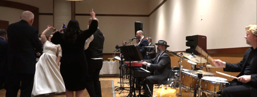 bride twirling to "Dancing Queen" played live by The Way Band