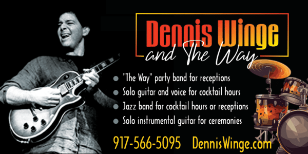 Wedding guitarist Dennis Winge playing at a reception.