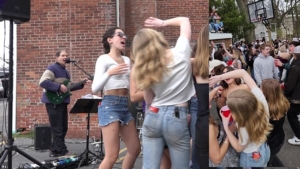 girls dancing to live band at fraternity party