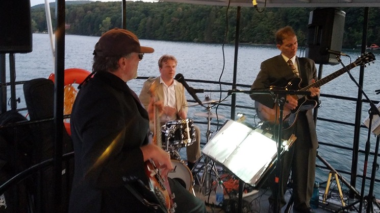 The Way Band trio on boat