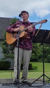 Dennis singing and playing guitar at Bethany Retirement Home