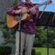 Dennis singing and playing guitar at Bethany Retirement Home