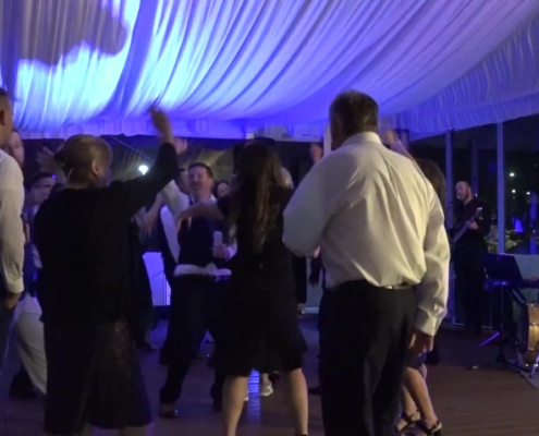 groom and guests dancing at Hope Lake Lodge wedding