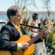 guitarist near wedding couple during ceremony