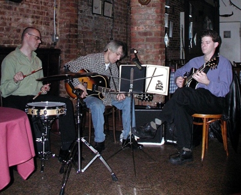 Ron Parmentier and Dennis Winge and Cole playing a gig