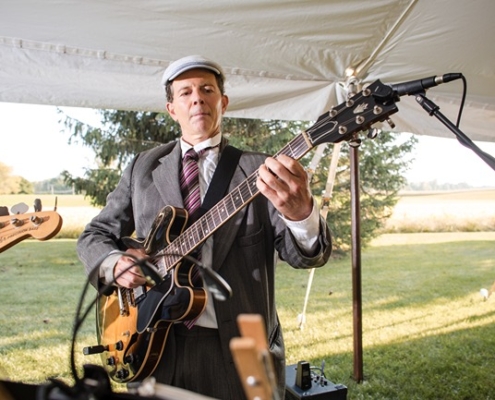 Dennis Winge playing in Salsa Ithacana