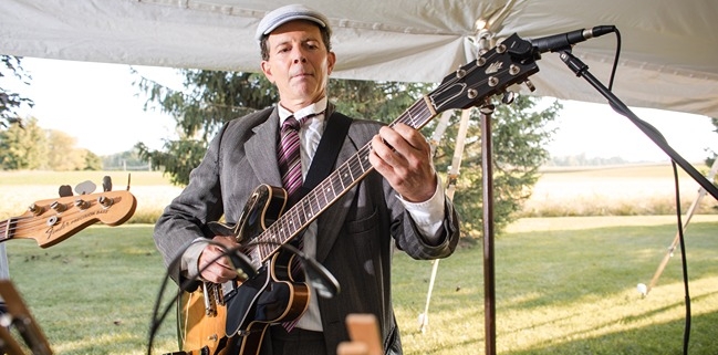 Dennis Winge playing in Salsa Ithacana