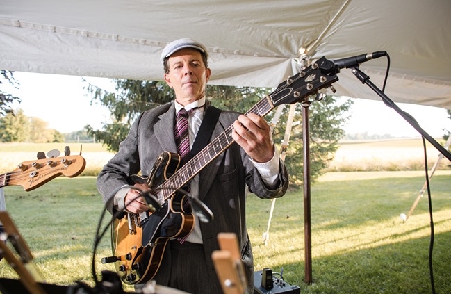 Dennis Winge playing in Salsa Ithacana