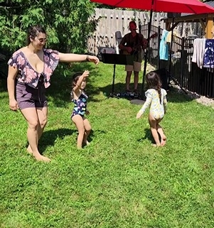 kids dancing at family party to live music