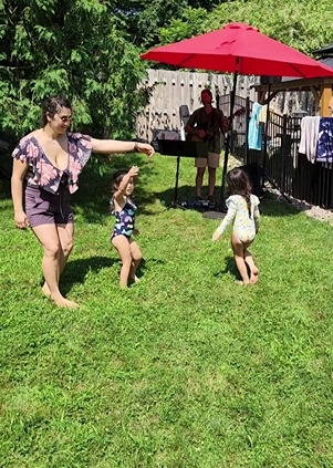 kids dancing at family party to live music