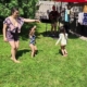 kids dancing at family party to live music