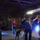 people dancing with dog at country wedding