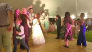 dancing to salsa band at wedding