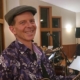 Dennis smiling at Joy of Latin Jazz interactive concert