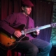 Dennis Winge performing at Art of Solo Guitar concert at Downstairs in Ithaca NY