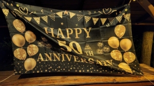 sign at 50th anniversary party with Blue Train blues band