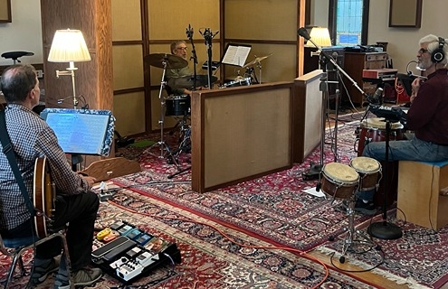 Sunset Salsa band in recording studio