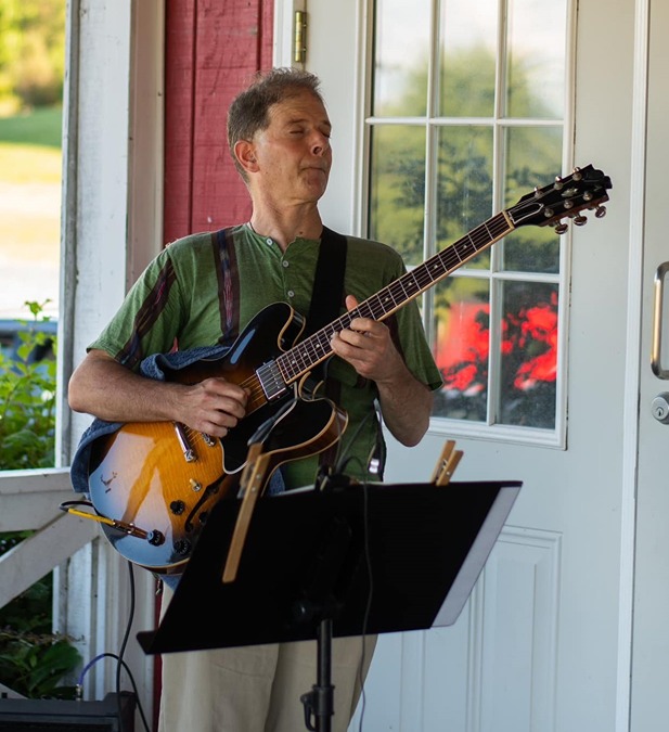 guitar player for Sunset Salsa