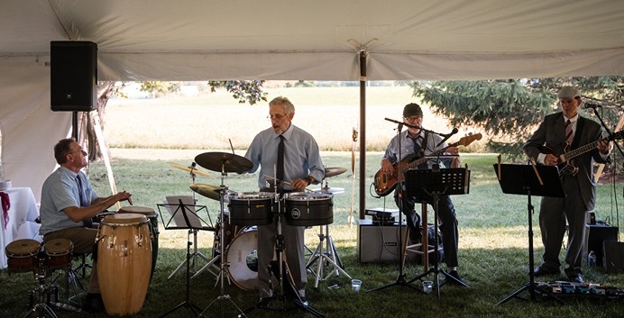 Sunset Salsa under a tent at wedding