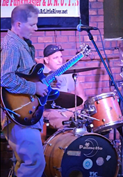 Dennis playing at Jay's in Little River jam