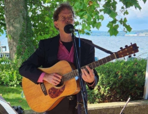 Dennis singing at wedding cocktail hour