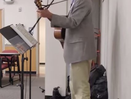 dennis playing at corporate event