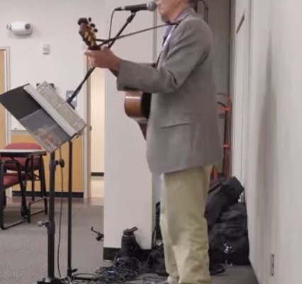 dennis playing at corporate event