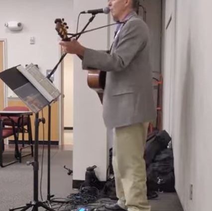 dennis playing at corporate event