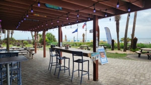 outdoor patio at beachfront kitchen & bar