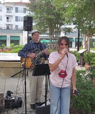 singer sitting in at Market Common Fashion Week event 2026