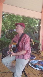 Dennis Winge performing at Our Place on 17