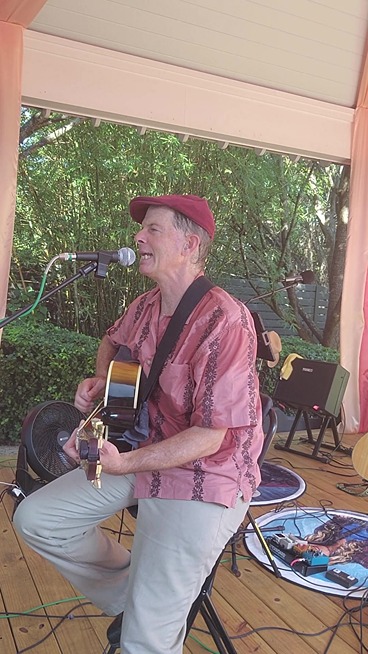 Dennis Winge performing at Our Place on 17