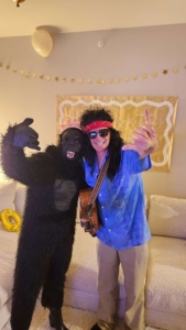 Dennis with woman in gorilla suit on a singing telegram